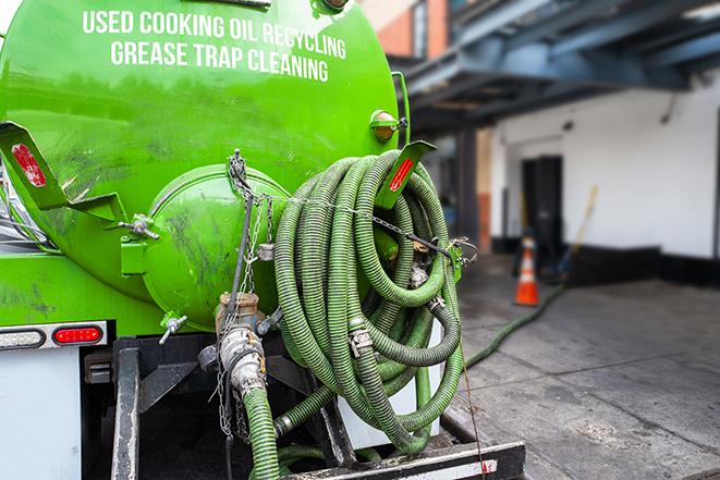 a grease trap pumping truck at a restaurant in Benicia, CA